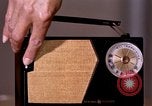 Image of transistor radio United States USA, 1961, second 20 stock footage video 65675028236