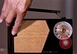 Image of transistor radio United States USA, 1961, second 21 stock footage video 65675028236