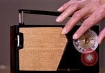 Image of transistor radio United States USA, 1961, second 23 stock footage video 65675028236