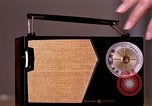 Image of transistor radio United States USA, 1961, second 26 stock footage video 65675028236