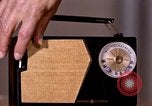 Image of transistor radio United States USA, 1961, second 31 stock footage video 65675028236