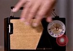 Image of transistor radio United States USA, 1961, second 34 stock footage video 65675028236