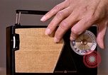 Image of transistor radio United States USA, 1961, second 38 stock footage video 65675028236