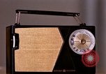 Image of transistor radio United States USA, 1961, second 39 stock footage video 65675028236