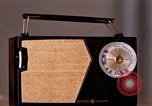 Image of transistor radio United States USA, 1961, second 41 stock footage video 65675028236