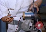 Image of technician United States USA, 1961, second 8 stock footage video 65675028237