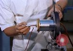 Image of technician United States USA, 1961, second 9 stock footage video 65675028237