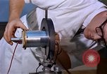Image of technician United States USA, 1961, second 13 stock footage video 65675028237