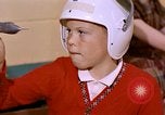 Image of American boy United States USA, 1961, second 12 stock footage video 65675028246