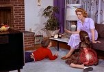 Standbild Amerikanerin United States USA, 1961, aus Sekunde 23 historischem Filmmaterial Videoclip 65675028249