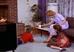 Standbild Amerikanerin United States USA, 1961, aus Sekunde 29 historischem Filmmaterial Videoclip 65675028249