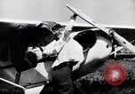 Image of piper cub Pacific Theater, 1944, second 19 stock footage video 65675028378
