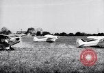 Image of piper cub Pacific Theater, 1944, second 23 stock footage video 65675028378