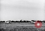 Image of piper cub Pacific Theater, 1944, second 30 stock footage video 65675028378