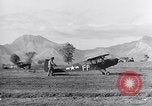 Image of piper cub Pacific Theater, 1944, second 34 stock footage video 65675028378