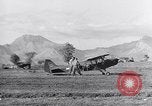 Image of piper cub Pacific Theater, 1944, second 36 stock footage video 65675028378