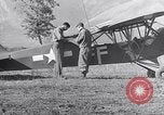 Image of piper cub Pacific Theater, 1944, second 38 stock footage video 65675028378