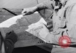 Image of piper cub Pacific Theater, 1944, second 39 stock footage video 65675028378