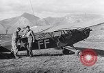 Image of piper cub Pacific Theater, 1944, second 41 stock footage video 65675028378