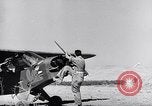 Image of piper cub Pacific Theater, 1944, second 45 stock footage video 65675028378