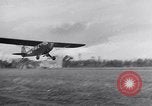 Image of piper cub Pacific Theater, 1944, second 50 stock footage video 65675028378