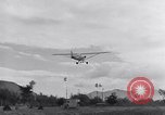 Image of piper cub Pacific Theater, 1944, second 52 stock footage video 65675028378