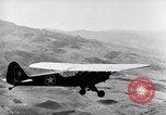 Image of piper cub Pacific Theater, 1944, second 55 stock footage video 65675028378