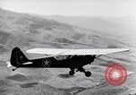 Image of piper cub Pacific Theater, 1944, second 57 stock footage video 65675028378