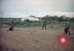 Image of sentry dog patrolling field Tan Son Nhut Air Force Base Vietnam, 1965, second 9 stock footage video 65675028506