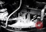 Image of rubber factory United States USA, 1943, second 52 stock footage video 65675028526