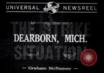 Image of factory workers strike and fight Dearborn Michigan USA, 1941, second 7 stock footage video 65675028543