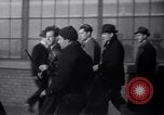 Image of factory workers strike and fight Dearborn Michigan USA, 1941, second 35 stock footage video 65675028543