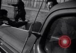 Image of factory workers strike and fight Dearborn Michigan USA, 1941, second 36 stock footage video 65675028543