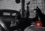 Image of factory workers strike and fight Dearborn Michigan USA, 1941, second 38 stock footage video 65675028543