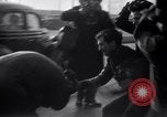 Image of factory workers strike and fight Dearborn Michigan USA, 1941, second 44 stock footage video 65675028543