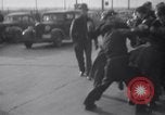 Image of factory workers strike and fight Dearborn Michigan USA, 1941, second 50 stock footage video 65675028543