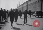 Image of factory workers strike and fight Dearborn Michigan USA, 1941, second 58 stock footage video 65675028543