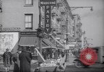 Image of Street scene in Little Italy New York City USA, 1941, second 4 stock footage video 65675028562