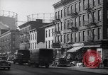 Image of Street scene in Little Italy New York City USA, 1941, second 38 stock footage video 65675028562