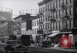 Image of Street scene in Little Italy New York City USA, 1941, second 39 stock footage video 65675028562