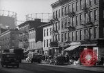 Image of Street scene in Little Italy New York City USA, 1941, second 41 stock footage video 65675028562