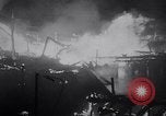Image of fire on riverfront New Jersey United States USA, 1964, second 18 stock footage video 65675028591