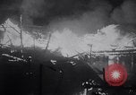 Image of fire on riverfront New Jersey United States USA, 1964, second 19 stock footage video 65675028591