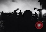 Image of fire on riverfront New Jersey United States USA, 1964, second 21 stock footage video 65675028591