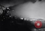 Image of fire on riverfront New Jersey United States USA, 1964, second 35 stock footage video 65675028591