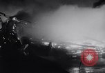 Image of fire on riverfront New Jersey United States USA, 1964, second 36 stock footage video 65675028591