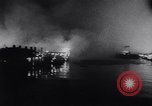 Image of fire on riverfront New Jersey United States USA, 1964, second 46 stock footage video 65675028591