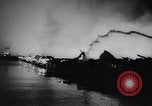 Image of fire on riverfront New Jersey United States USA, 1964, second 49 stock footage video 65675028591