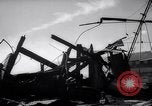 Image of fire on riverfront New Jersey United States USA, 1964, second 62 stock footage video 65675028591