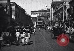 Immagine di Strada trafficata in una città India, 1953, secondo 15 filmato di repertorio 65675028598